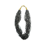 An elegant shimmer of glass beads knotted to create this effortless and stylish necklace. You’ll dazzle at your next meeting or brunch with your girls.