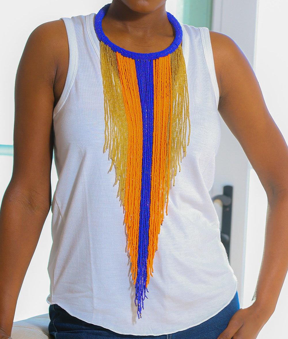 An illustrious display of beadwork. The Diama necklace is a stunning statement piece. Uniquely handcrafted, each bead strung by hand.