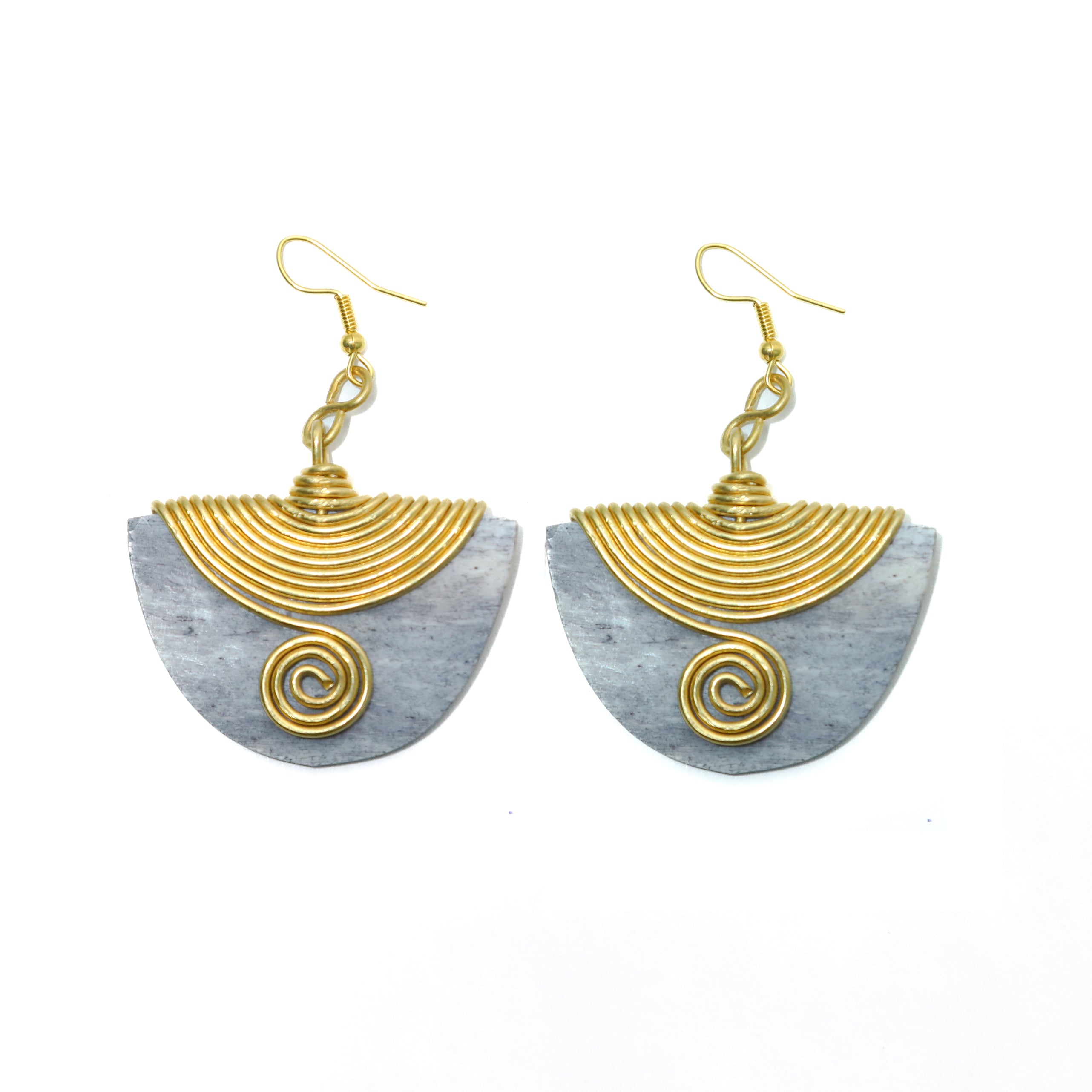 The Enzi earrings are handmade with love. They are lightweight and made from repurposed material. Perfect for any occasion.