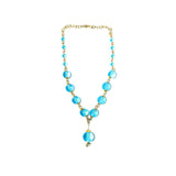 The Makena II necklace is bold and delicate. Made from recycled glass bottles. Pair it with the earrings for a stunning look.