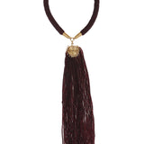 A collection of glass beads delicately strung to create this vivid tassle necklace. The beauty of African jewlery is showcased in this gorgeous handcrafted necklace.
