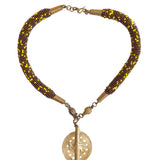 This stunning Mila beaded necklace perfectly combined with a brass baule bead is unique and one-of-a-kind. Get ready to make a show stopping statement.