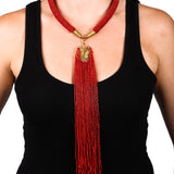 A necklace intended to make you stop and look twice. Handcrafted by artisans in East-Africa. The Kalia necklace can be worn with your favorite summer tank top or a simple blouse.