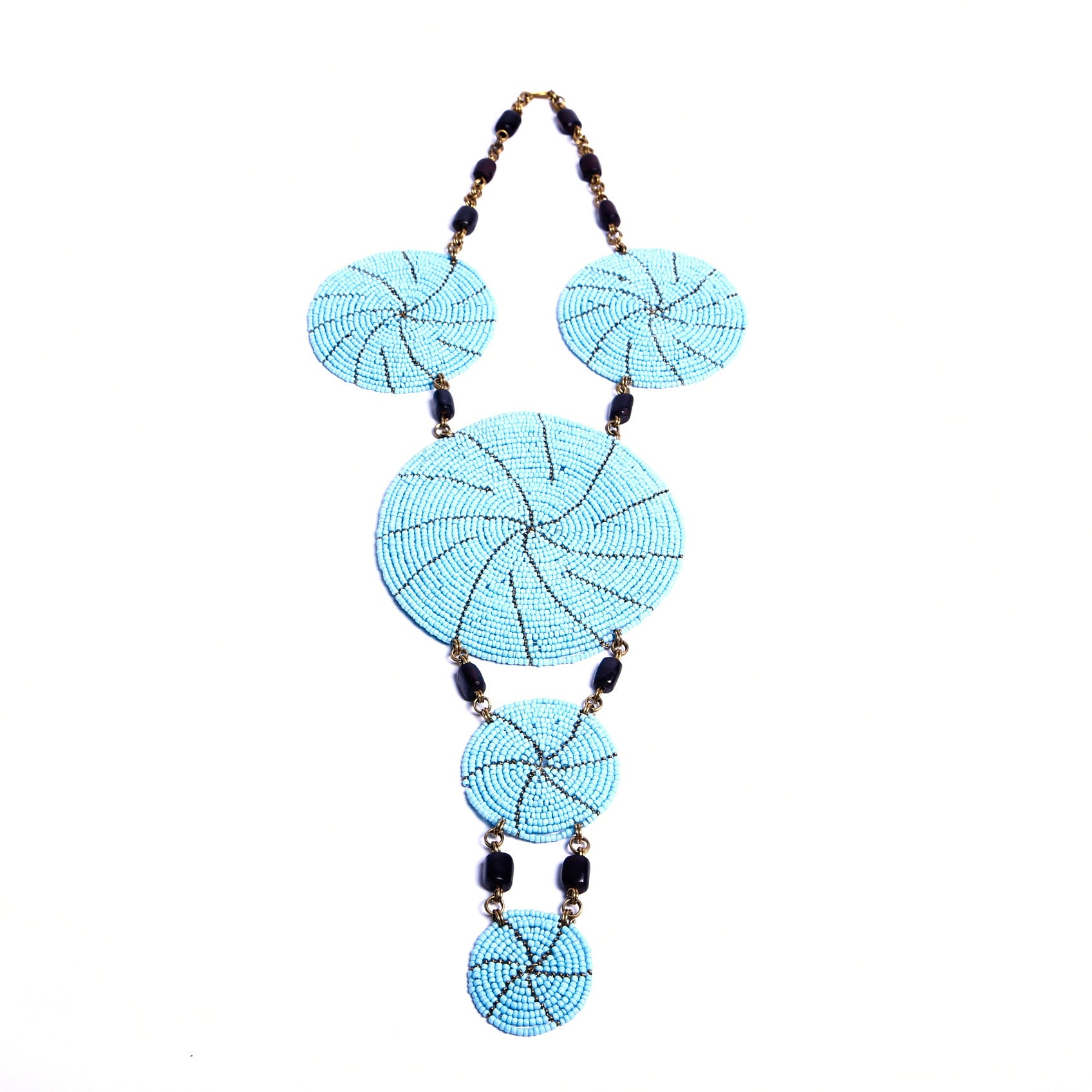 Eye-catching handcrafted statement necklace in this gorgeous sky blue. Each bead is intricately strung by hand. Truly unique and one-of-a-kind African necklace.