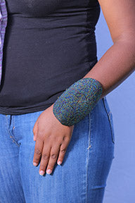 Beaded cuff bracelet- the ultimate power accessory for bold and fearless style.