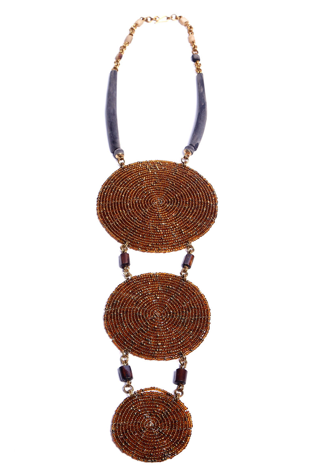 This stunning one-of-a-kind necklace features hundreds of brown glass beads each individually placed by hand, giving it a bold and striking design. Get lots of compliments on this unique and bold statement necklace.