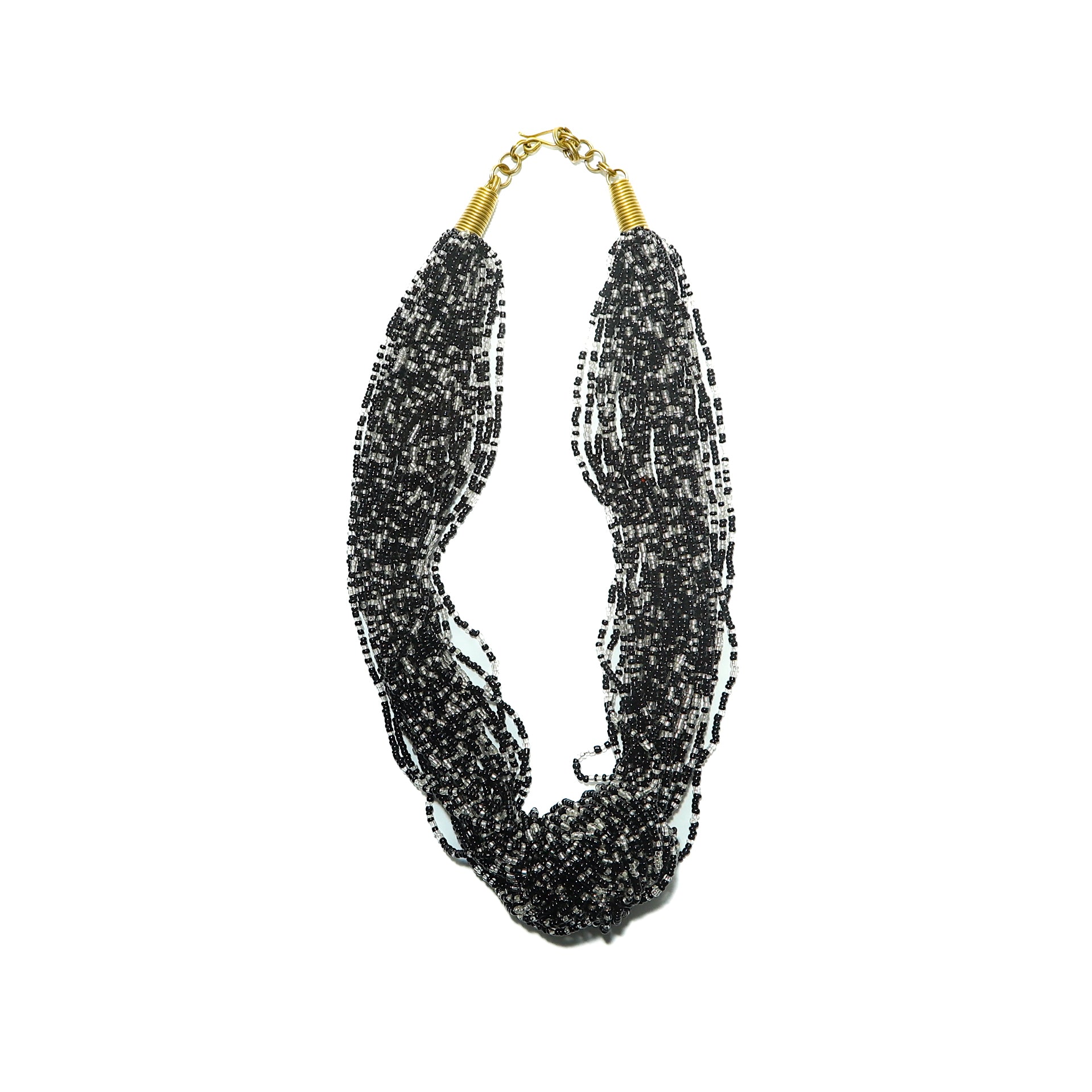 An elegant shimmer of glass beads knotted to create this effortless and stylish necklace. You’ll dazzle at your next  meeting or brunch with your girls.