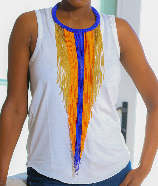 An illustrious display of beadwork. The Diama necklace is a stunning statement piece. Uniquely handcrafted, each bead strung by hand.