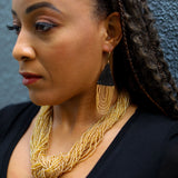 The refined shape and airy feel of these stunning beaded earrings make them easy to wear no matter where life takes you.