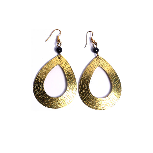 Striking tear-drop brass earrings. Handcrafted with care and attention to detail, these earrings will add a special touch of style and flair to your look.