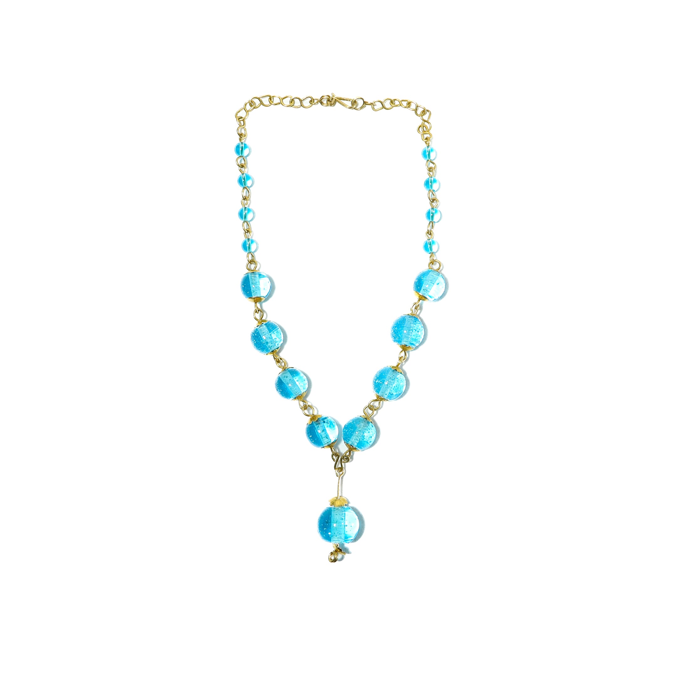 The Makena II necklace is bold and delicate. Made from recycled glass bottles. Pair it with the earrings for a stunning look.