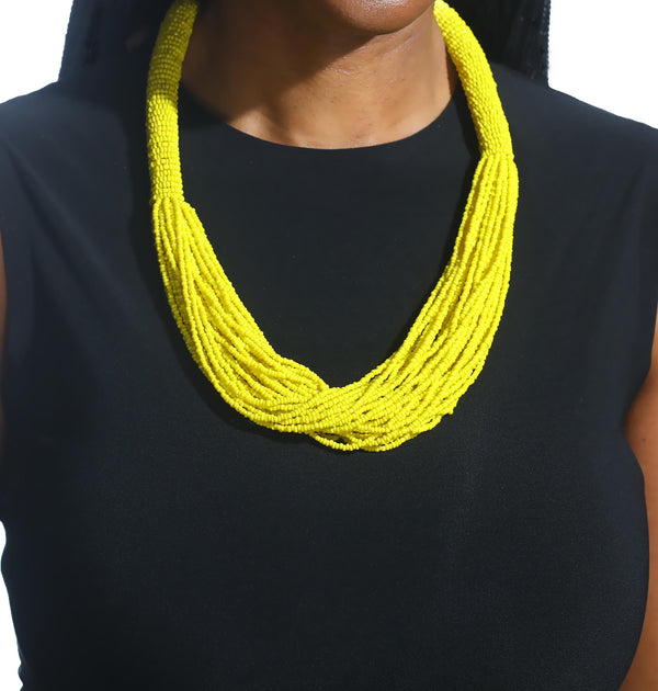 The Kari beaded necklace is perfect for you! Crafted with unparalleled attention to detail, a statement piece that exudes African-inspired glamor. Add a vibrant touch of color to any outfit.