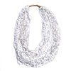 Strung with 20 individual strands of glass seed beads to create this cascading splash of color. The various bead sizes give the Lani an interesting texture that will turn heads every time you wear it. Pair it with a white t-shirt and jeans for an effortless look.
