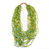Strung with 20 individual strands of glass seed beads to create this cascading splash of color. The various bead sizes give the Lani an interesting texture that will turn heads every time you wear it. Pair it with a white t-shirt and jeans for an effortless look.