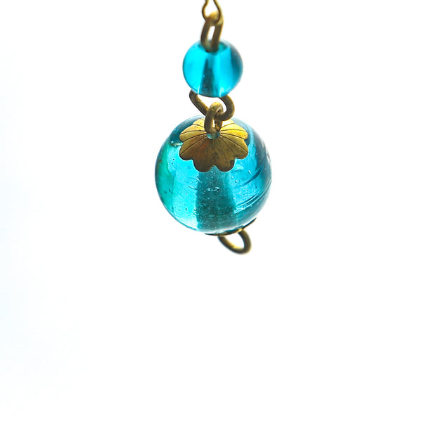 Handcrafted recycled glass earrings add simple and elegant style.