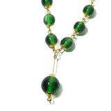 The Makena II necklace is bold and delicate. Made from recycled glass bottles. Pair it with the earrings for a stunning look.