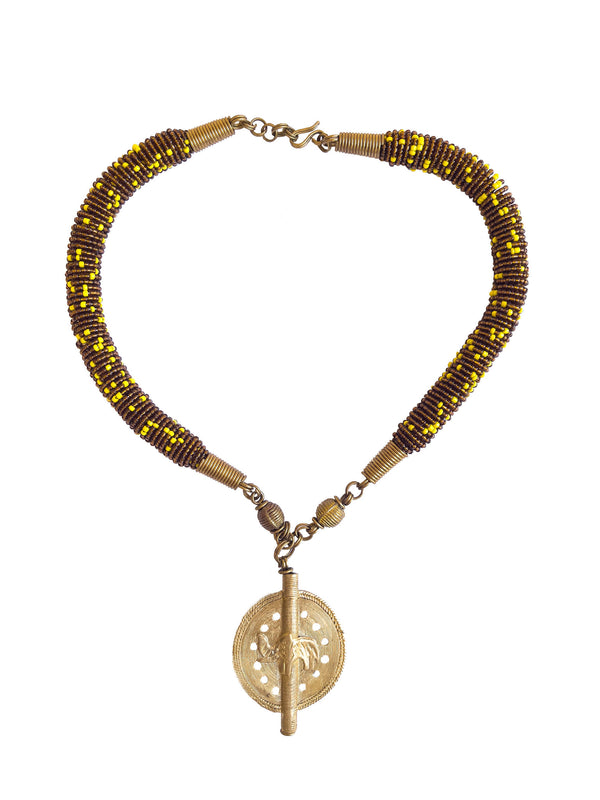 This stunning Mila beaded necklace perfectly combined with a brass baule bead is unique and one-of-a-kind. Get ready to make a show stopping statement.