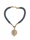 With gorgeous blue beads reminiscent of the ocean. This stunning Mila beaded necklace perfectly combined with a brass baule bead is unique and one-of-a-kind. Get ready to make a show stopping statement.
