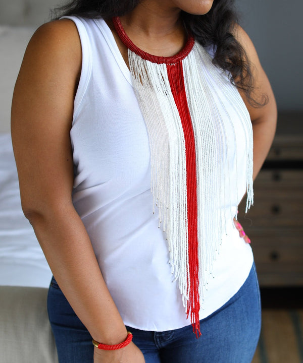 An illustrious display of beadwork. The Diama necklace is a stunning statement piece. Uniquely handcrafted, each bead strung by hand.