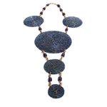 Eye-catching handcrafted statement necklace. Each bead is intricately strung by hand. Truly unique and one-of-a-kind African necklace.
