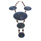 Eye-catching handcrafted statement necklace. Each bead is intricately strung by hand. Truly unique and one-of-a-kind African necklace.